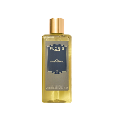 Transparent 250ml bottle of Floris London's No. 89 Bath & Shower Gel with a gold cap, blue label, infused with rich olive oil essence.