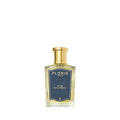 A Floris London No. 89 Eau de Toilette bottle, a signature gentleman's fragrance, has a gold cap and dark label on its clear glass.
