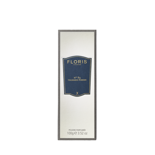 Floris London's No. 89 Fragrance Powder comes in a rectangular box with aloe vera, elegantly labeled in white and navy.