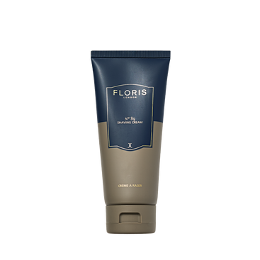 Floris London No. 89 - Shaving Cream 100ml, featuring aloe vera and the signature No.89 scent, stands upright in blue and taupe packaging.