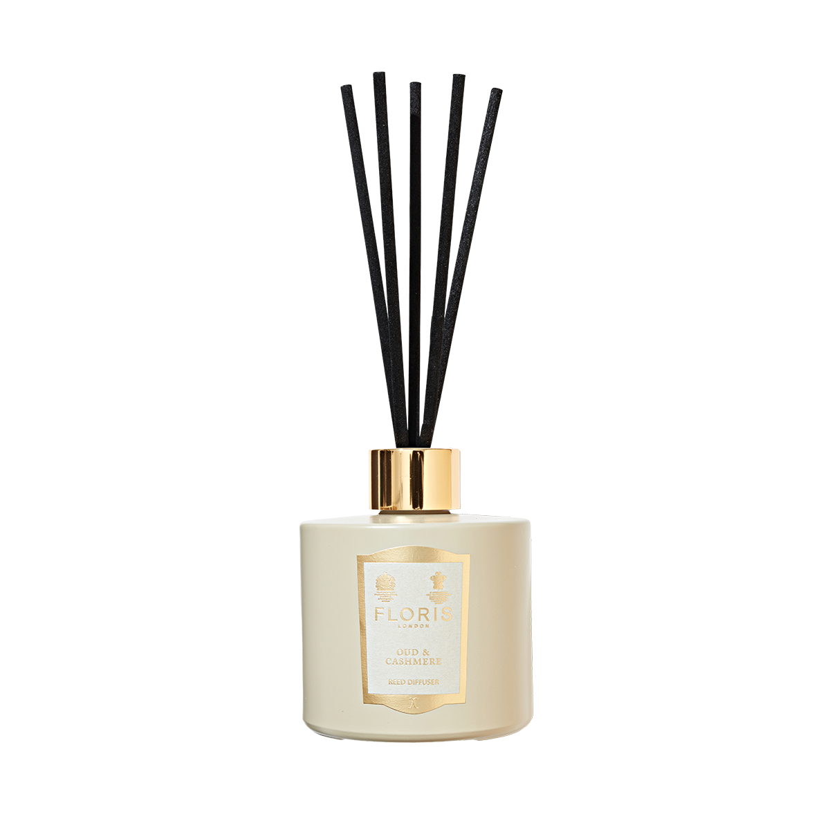 Floris London's Oud & Cashmere Reed Diffuser features a white diffuser with black reeds and a gold cap, blending luxurious Oud and Cashmere scents.