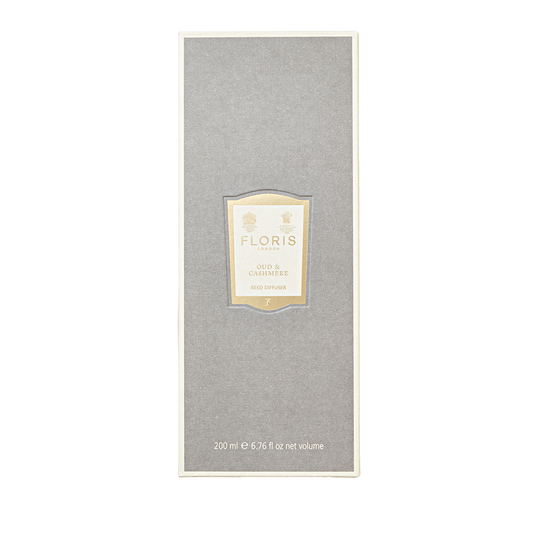 Floris London Oud & Cashmere 200ml reed diffuser in a gray rectangular box delivers an elegant home fragrance blend.