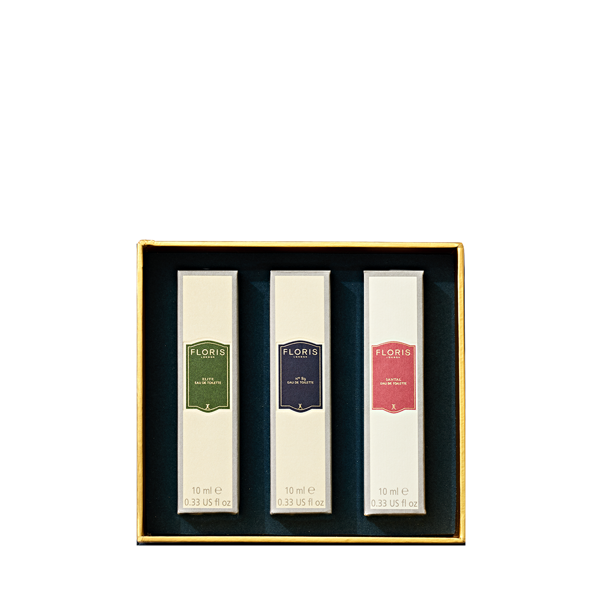 A gift box containing three rectangular spray bottles from the Floris London Perfumer’s Trilogy: For Him eau de toilette set.