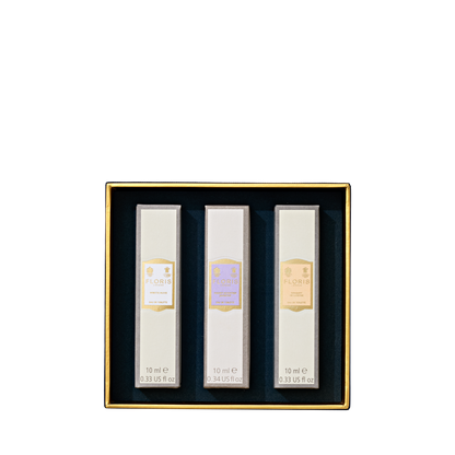 Floris London's Perfumer's Trilogy: For Her is a set of three perfumes, packaged in a black and gold box, each offering delicate floral fragrances.