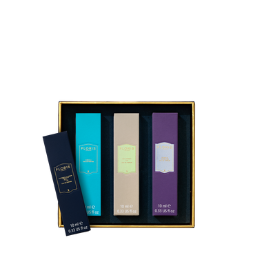 The Perfumer's Trilogy: Pick Your Own by Floris London is a customizable gift set in a black and gold box, with one bottle displayed elegantly outside.