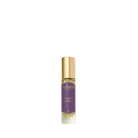Perfume bottle with a gold cap, featuring Floris London's "Platinum 22" Eau de Parfum, adorned with a purple label.