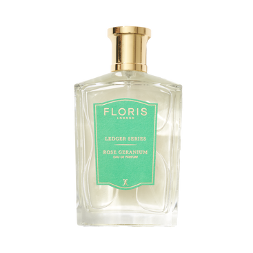 Transparent bottle with a gold cap, featuring a green "Floris London UK Rose Geranium" label, infused with cedarwood notes.