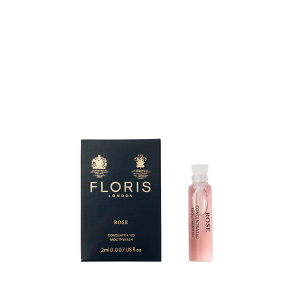 Floris London's Rose - Mouthwash features a bottle beside a black box with gold text, highlighting its pure rosewater essence.