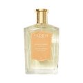 Clear perfume bottle labeled "Floris London UK, Sandalwood," featuring sandalwood oil with a gold cap and light brown label.
