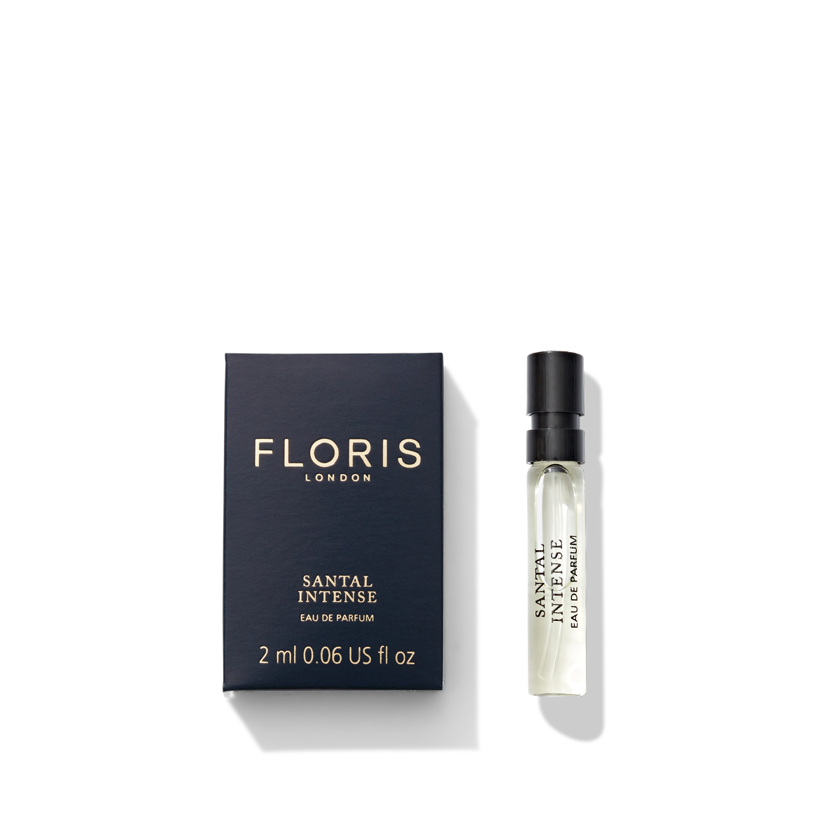a 2ml sample that says Santal Intense on it. It's next to a black box.