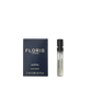 Floris London's Santal Eau de Toilette: a men's sandalwood fragrance in a dark box with gold text and a sleek transparent spray bottle, exuding sophistication.