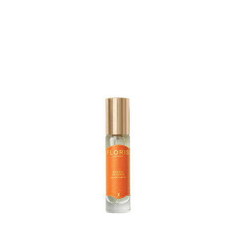 Small Floris London "Santal Intense - Eau de Parfum" bottle with gold cap, offering a modern scent with sandalwood notes.