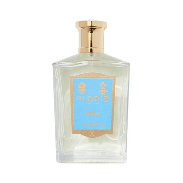 The Sirena Eau de Parfum by Floris London comes in a bottle with a gold cap and blue label, offering a tropical blend with an exquisite floral scent.
