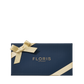 The Floris London Soap Collection comes in a navy gift box with "Floris London" and adorned with a gold ribbon and bow.