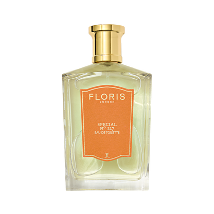 A Floris London Special No. 127 Eau de Toilette with a gold cap and orange label, offering historic elegance in lavender and bergamot notes.