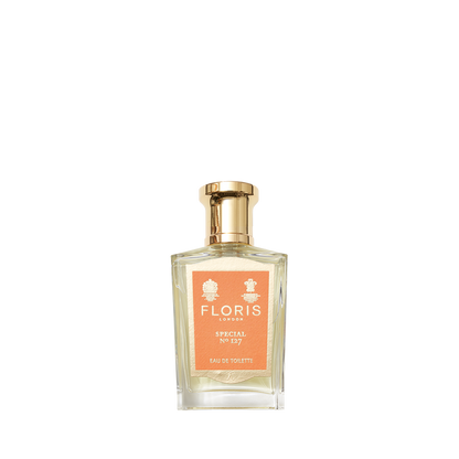 A rectangular glass bottle of Floris London's Special No. 127 Eau de Toilette has an orange label, gold cap, and exudes bergamot and lavender scents.