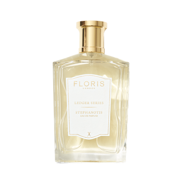 Floris London UK Stephanotis Eau de Parfum in a clear glass bottle with hints of jasmine, gold cap, and label.