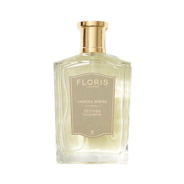 Elegant vetiver scent in a transparent bottle with a gold cap, labeled "Floris London UK Vetiver Eau de Parfum.