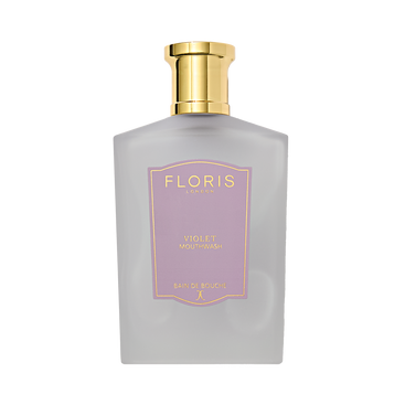 The elegant Frosted Violet Mouthwash by Floris London, with a gold cap and purple label, provides a luxurious fluoride-free dental experience.