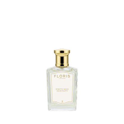 A clear glass Floris London White Rose - Eau de Toilette bottle with a gold cap, vegan, shown on a white background.
