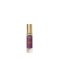Floris London's Wilde Eau de Parfum features a small spray bottle with a purple label and gold cap, capturing Oscar Wilde-inspired individuality.