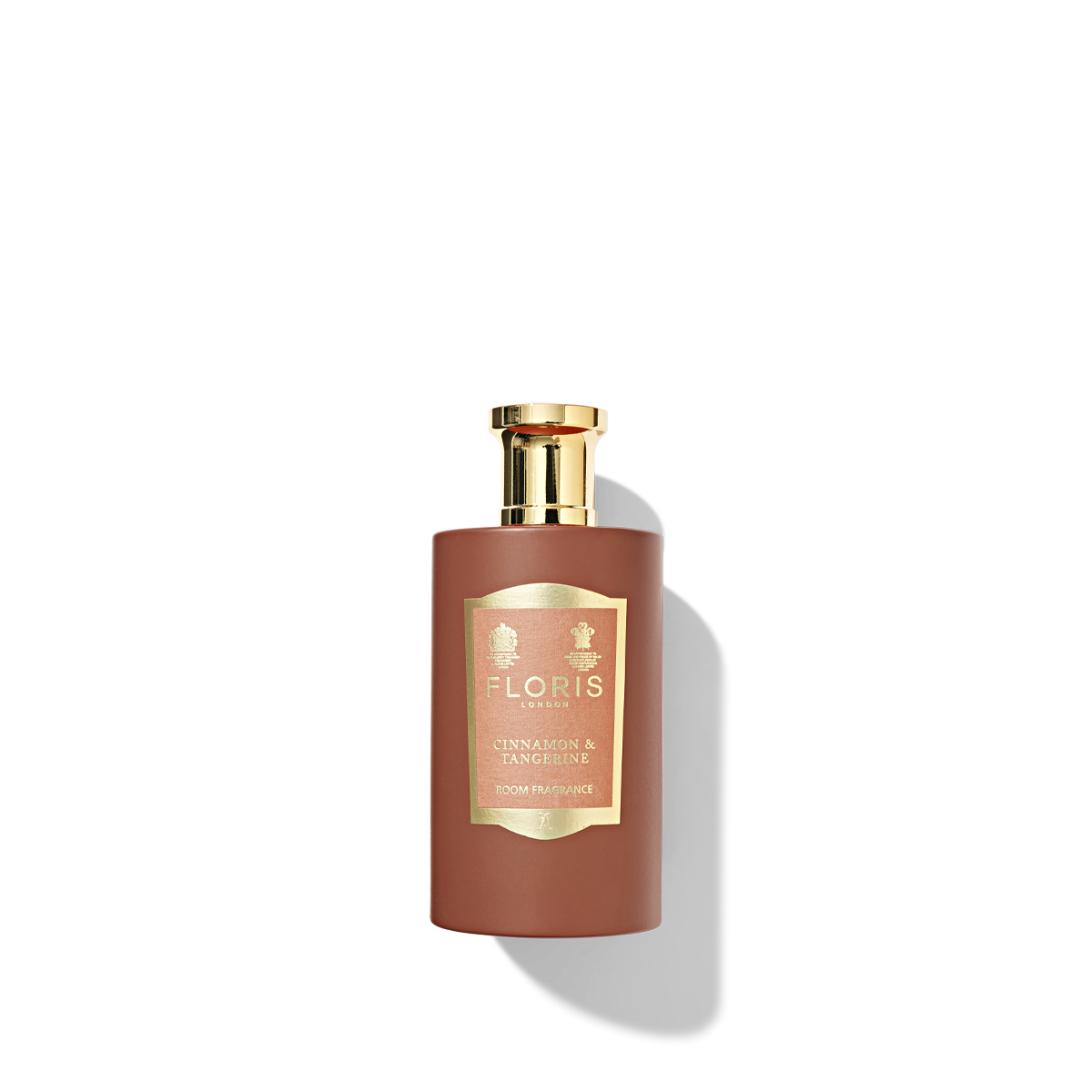 Orange room fragrance bottle with lid