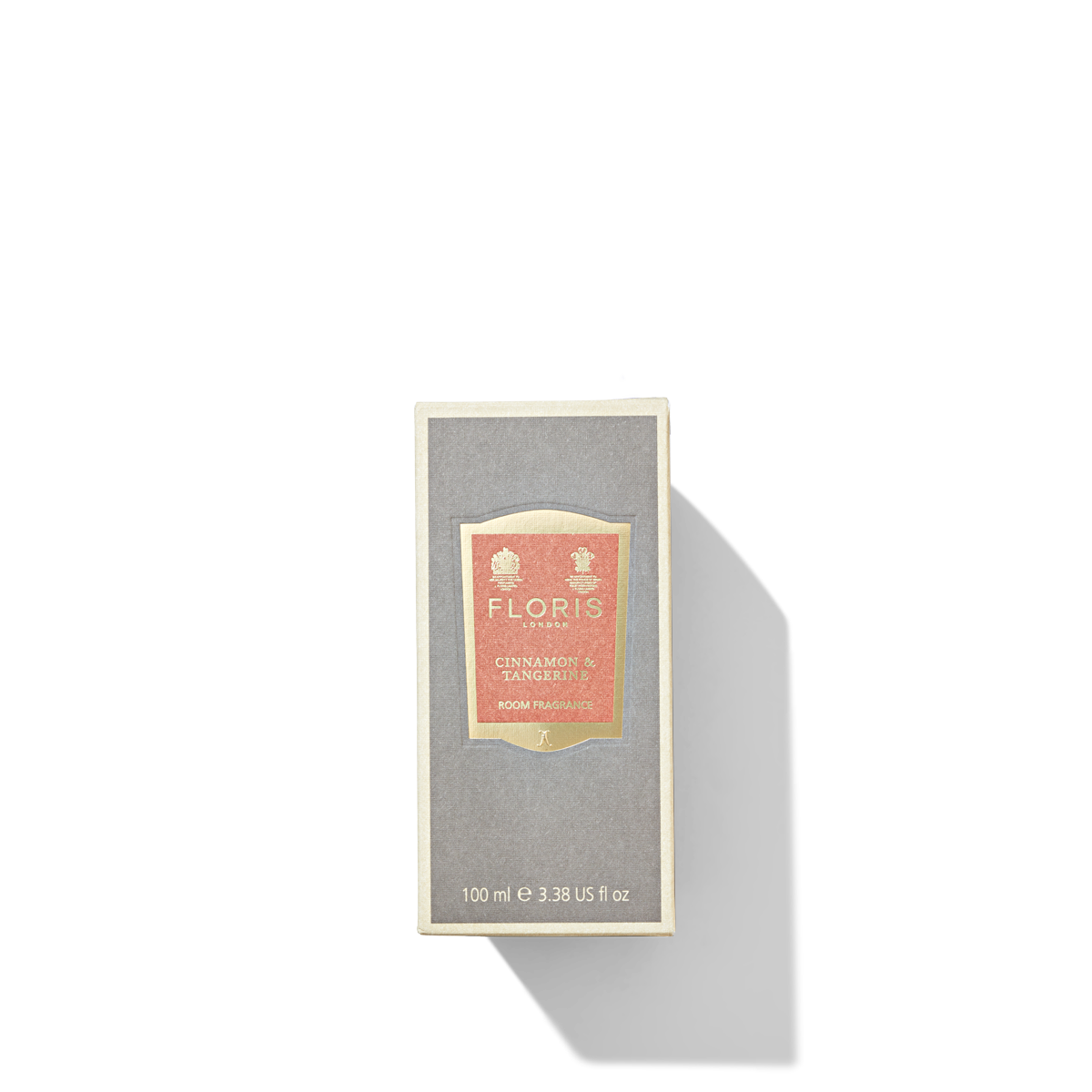 Grey room fragrance box with orange label