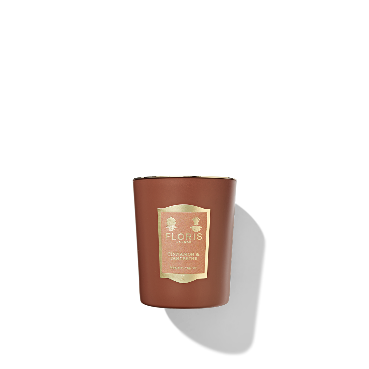 orange candle glass with orange label