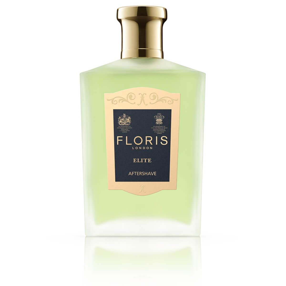 Green liquid in clear glass bottle with floris london logo 