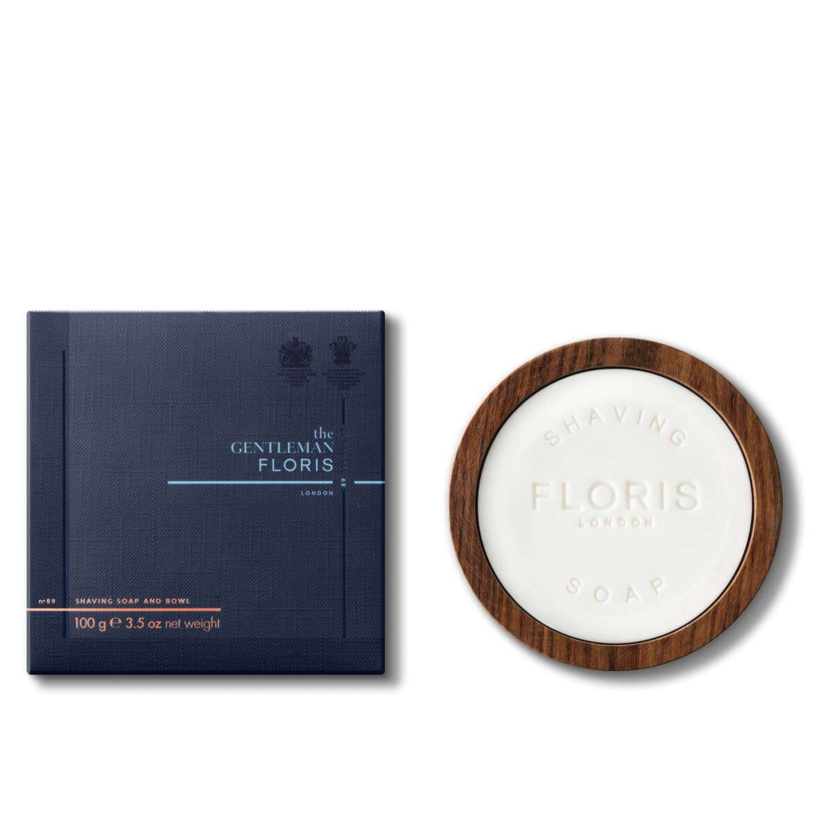 Wooden shaving bowl and soap next to box