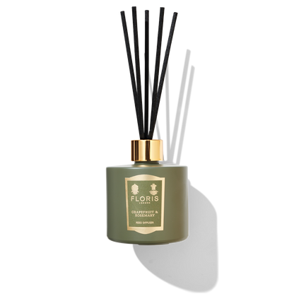 green diffuser glass with black reeds 