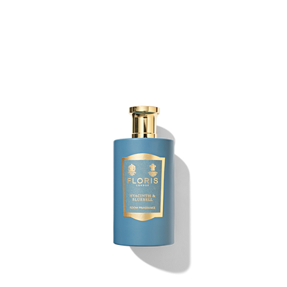blue and gold glass bottle with hyacinth & bluebell label