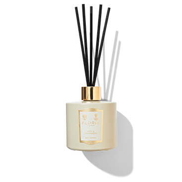 White Reed diffuser glass with black reed sticks