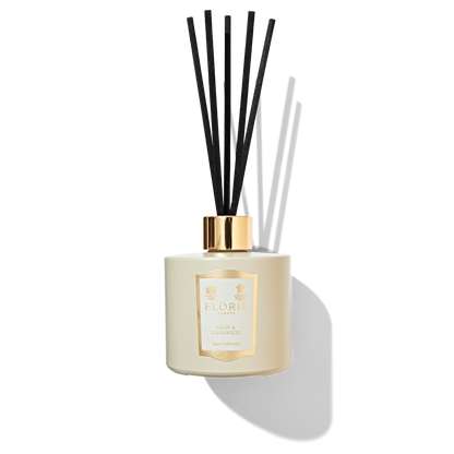 White Reed diffuser glass with black reed sticks