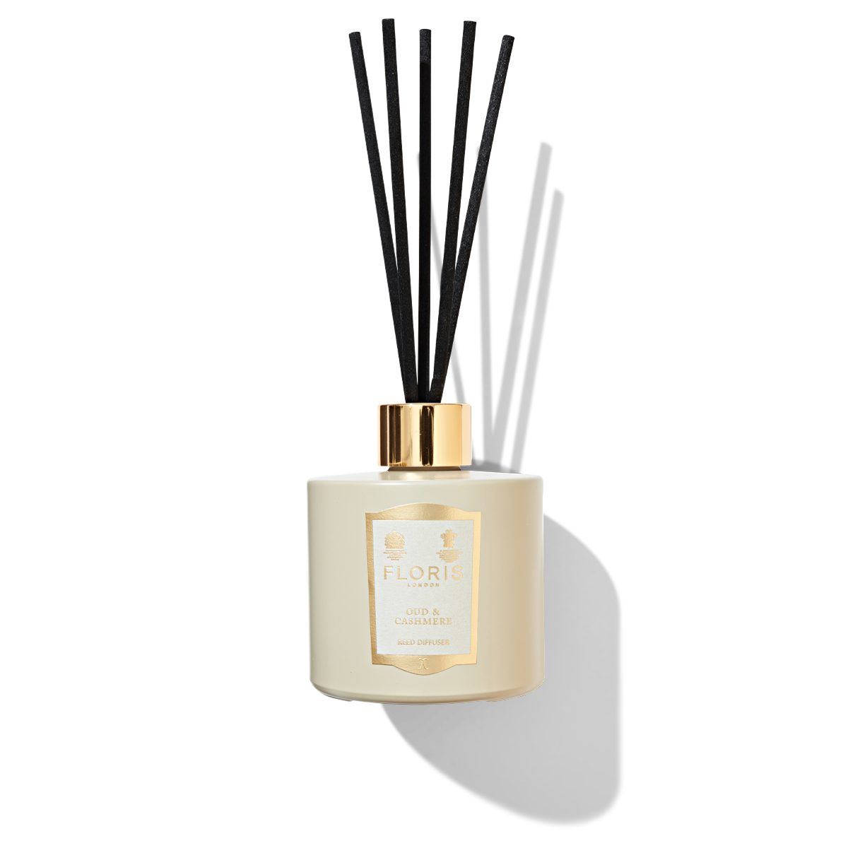 White Reed diffuser glass with black reed sticks